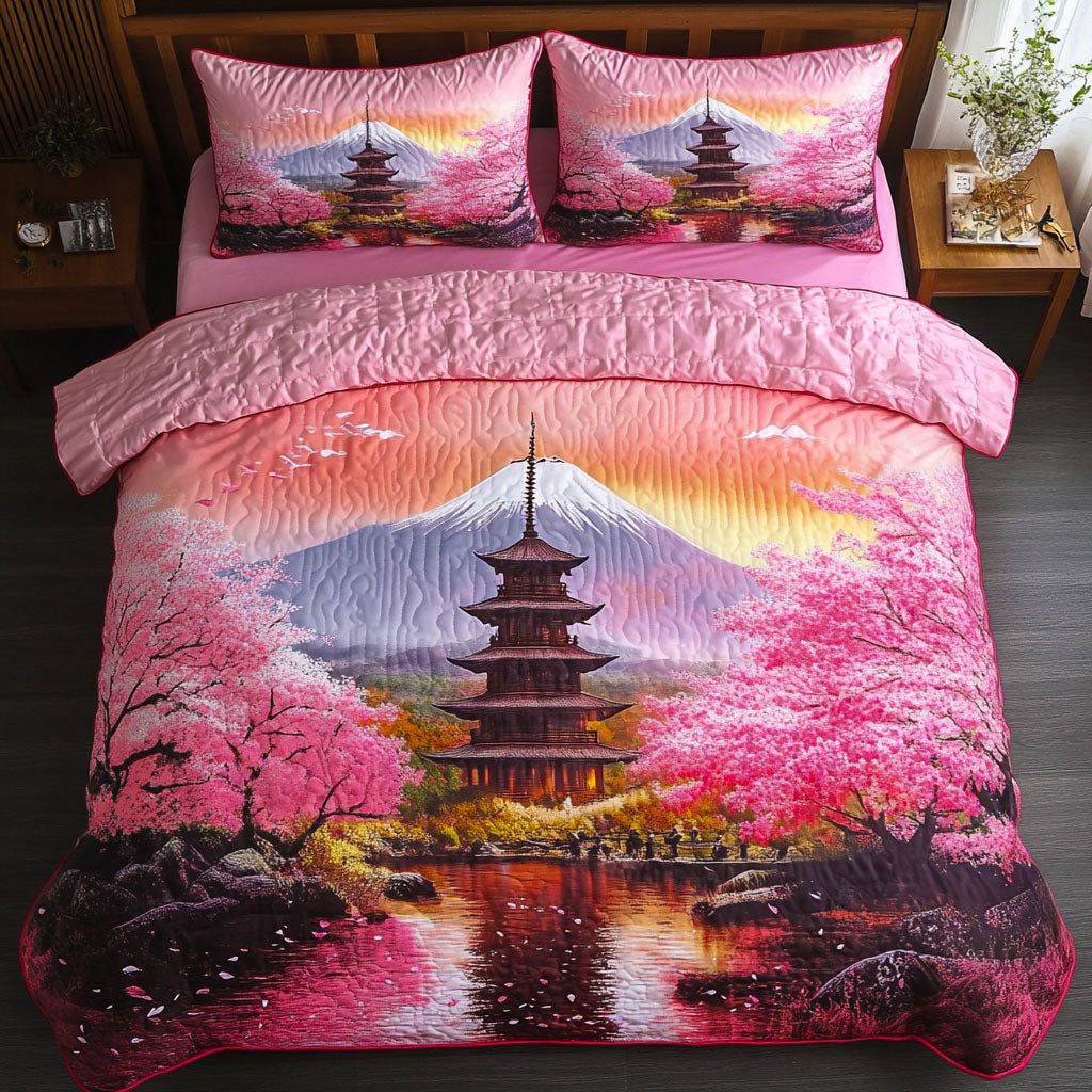 Rising Sun Path quilted 3-piece bedding set on a made bed with two matching pillow shams