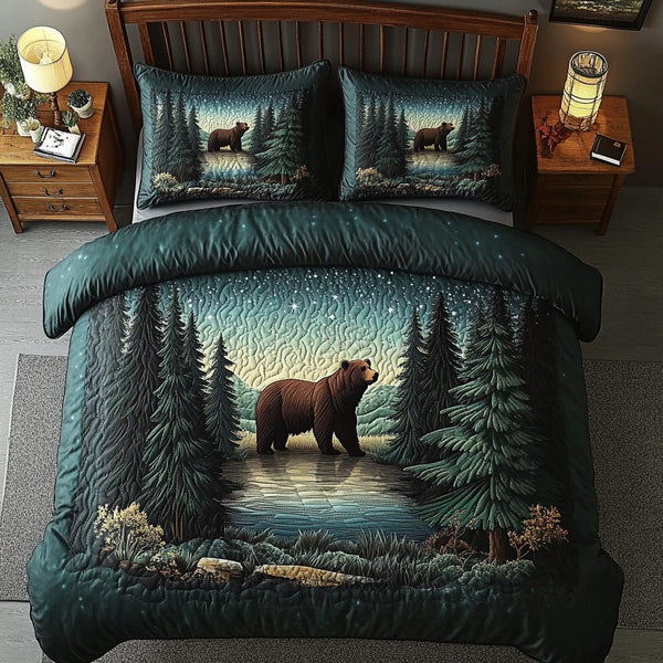 River Haven quilted 3-piece bedding set on a made bed with two matching pillow shams