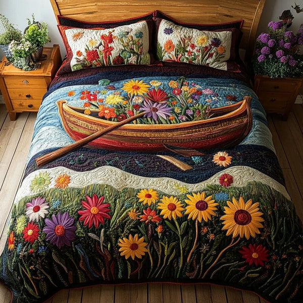 River of Blossoms quilted 3-piece bedding set on a made bed with two matching pillow shams