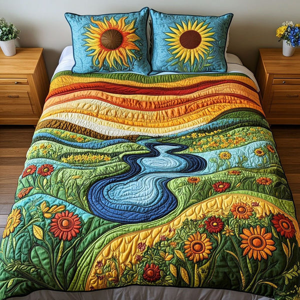 River of Gold quilted 3-piece bedding set on a made bed with two matching pillow shams