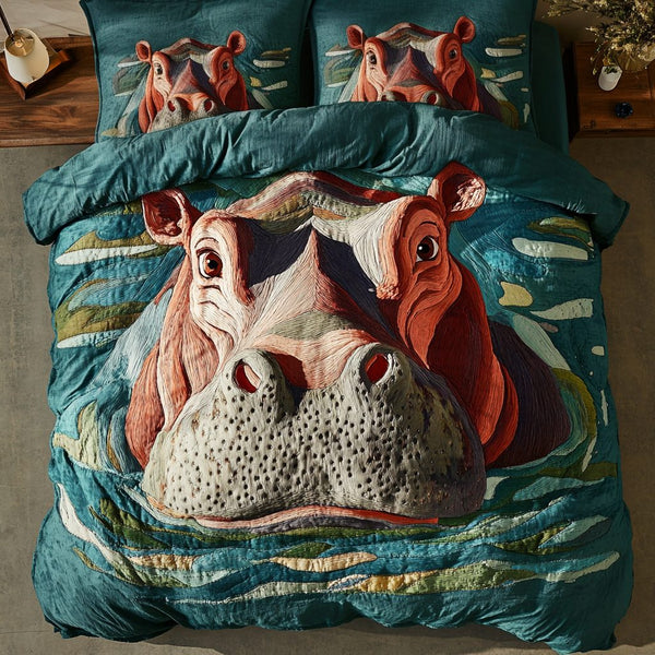 River Snuggle quilted 3-piece bedding set on a made bed with two matching pillow shams