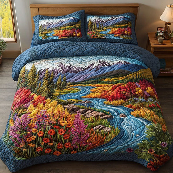 River Valley Colors quilted 3-piece bedding set on a made bed with two matching pillow shams
