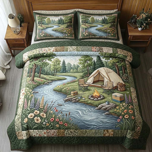 Riverbank Retreat quilted 3-piece bedding set on a made bed with two matching pillow shams