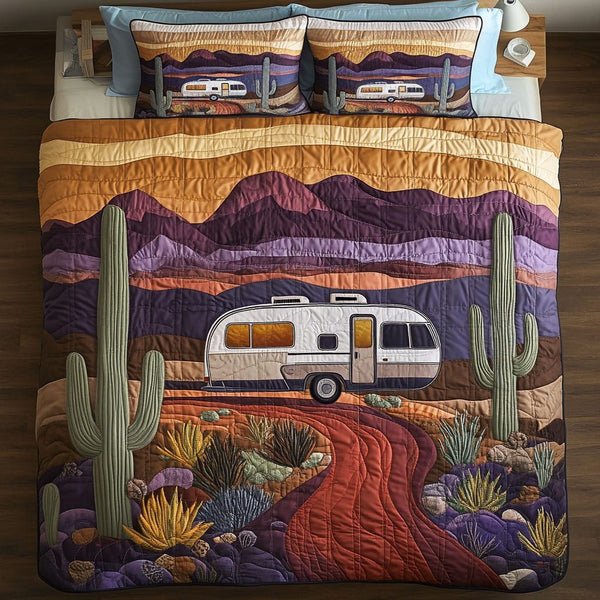 Road to Horizons quilted 3-piece bedding set on a made bed with two matching pillow shams