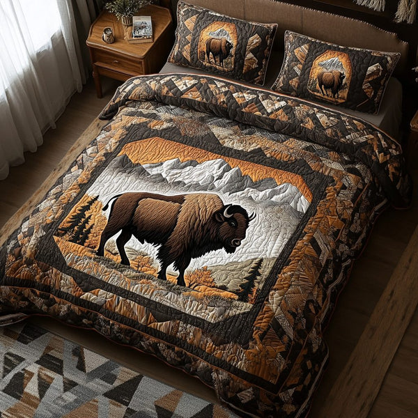 Roaming Plains quilted 3-piece bedding set on a made bed with two matching pillow shams