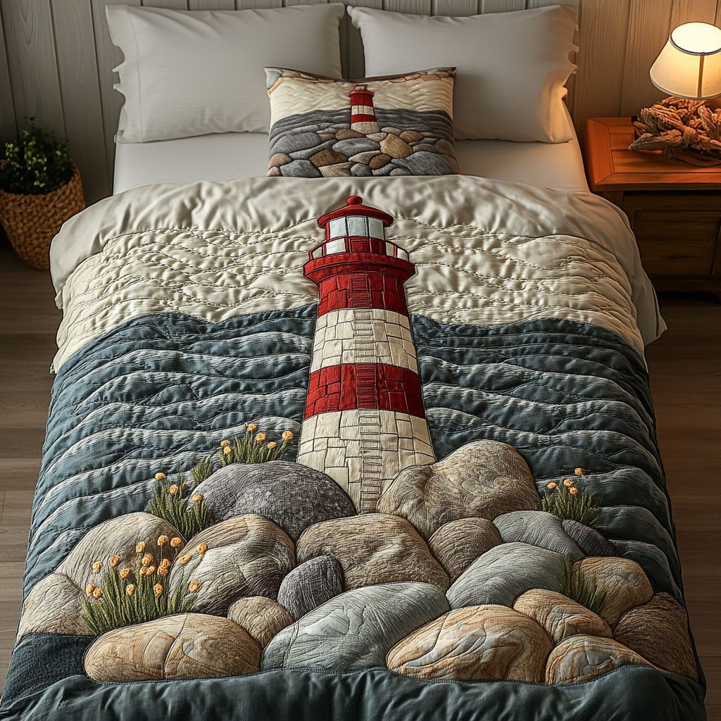 Rocky Shores Glow quilted 3-piece bedding set on a made bed in a light coastal bedroom