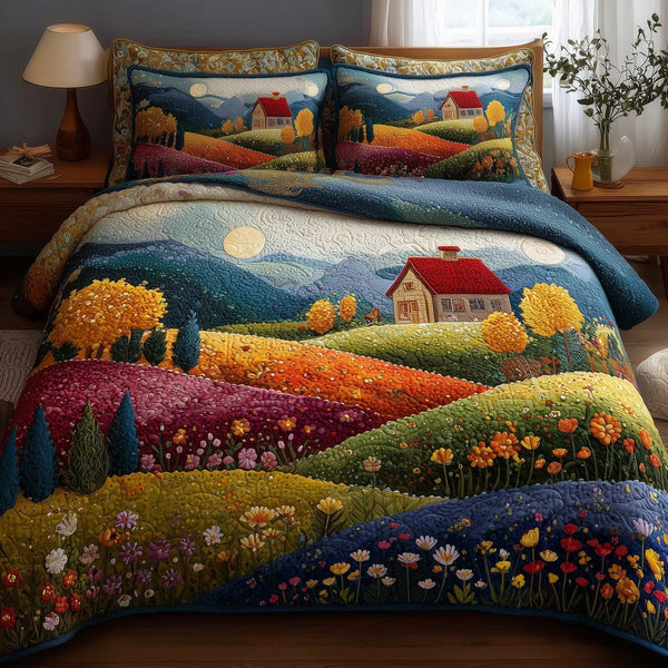 Rolling Heaven quilted 3-piece bedding set on a made bed in a softly lit bedroom