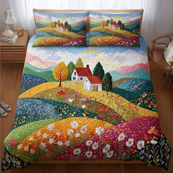 Rolling Heaven quilted 3-piece bedding set on a made bed in a softly lit bedroom
