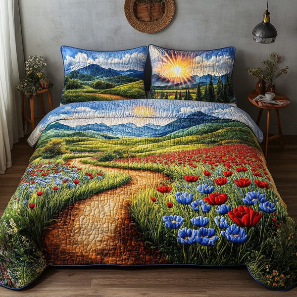 Rolling Hills Sunset quilted 3-piece bedding set on a made bed with two matching pillow shams