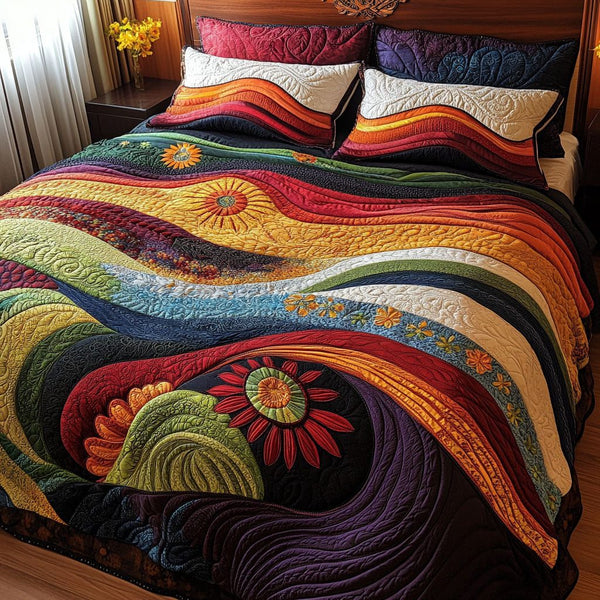 Rolling Tides quilted 3-piece bedding set on a made bed with two matching pillow shams