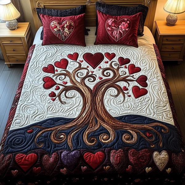 Romantic Roots quilted 3-piece bedding set on a made bed with two matching pillow shams