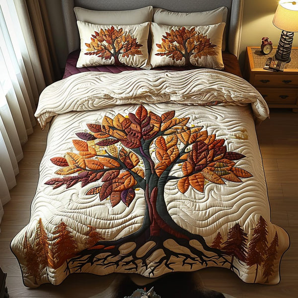 Rooted in Flame quilted 3-piece bedding set on a made bed with two matching pillow shams