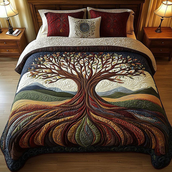 Rooted Legacy quilted 3-piece bedding set on a made bed with two matching pillow shams