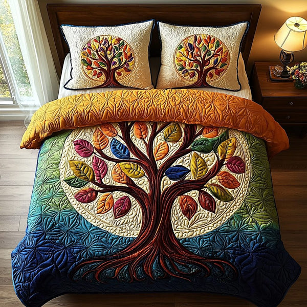 Rooted Soul quilted 3-piece bedding set on a made bed with two matching pillow shams