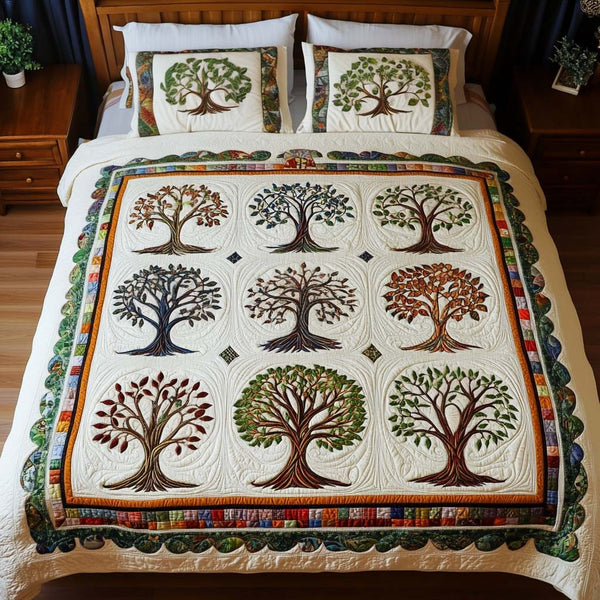 Roots Of Serenity quilted 3-piece bedding set on a made bed with two matching pillow shams