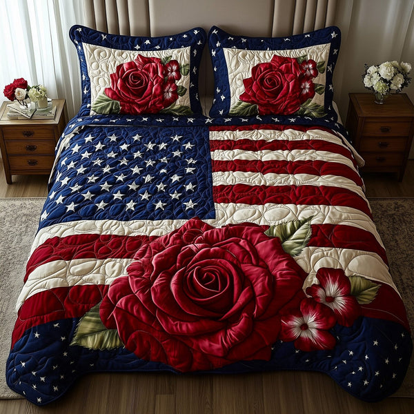 Rose and Glory quilted 3-piece bedding set on a made bed with two matching pillow shams