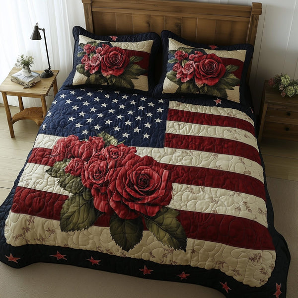 Rose and Glory quilted 3-piece bedding set on a made bed with two matching pillow shams