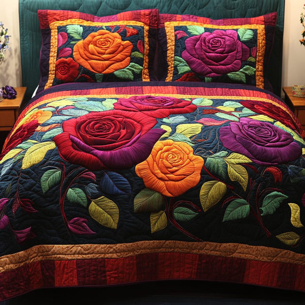 Rose Bloom quilted 3-piece bedding set on a made bed with two matching pillow shams