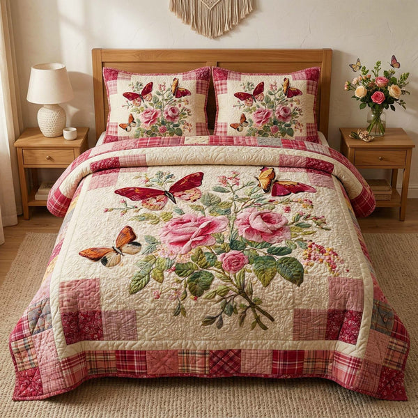 Rose Butterflies quilted 3-piece bedding set on a made bed with two matching pillow shams