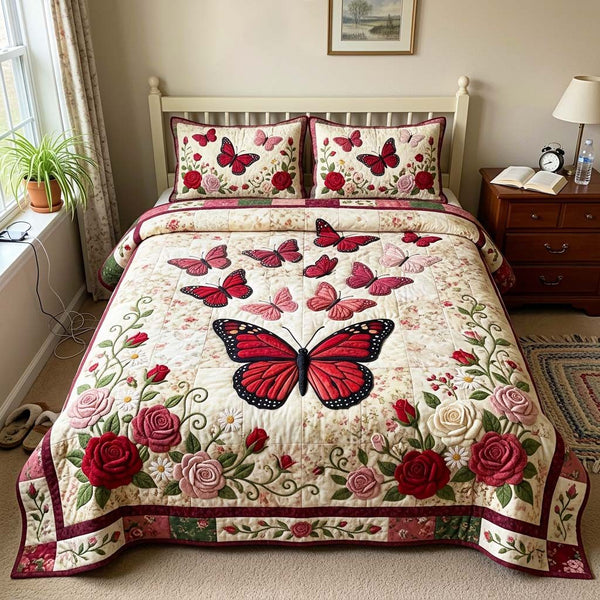 Rose Butterfly quilted 3-piece bedding set on a made bed with two matching pillow shams