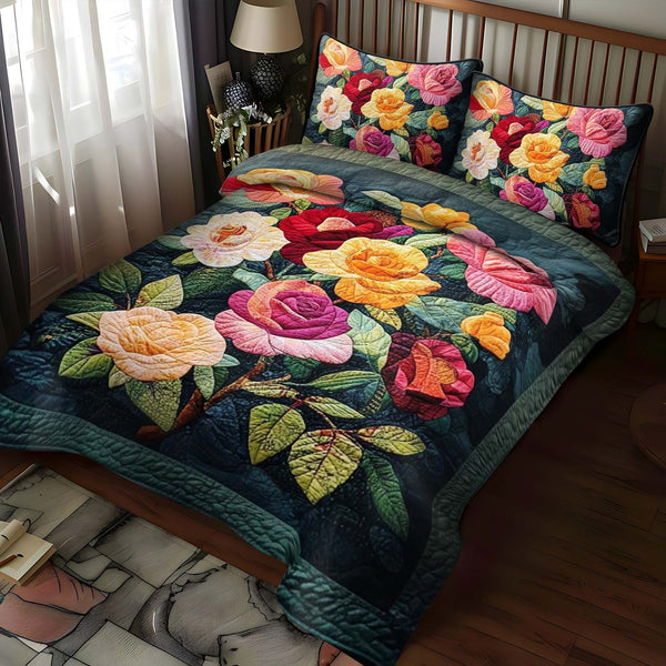 Rose Elegance quilted 3-piece bedding set on a made bed with two matching pillow shams