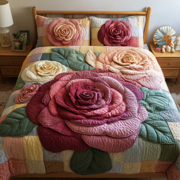 Rose Garden quilted 3-piece bedding set on a made bed with two matching pillow shams