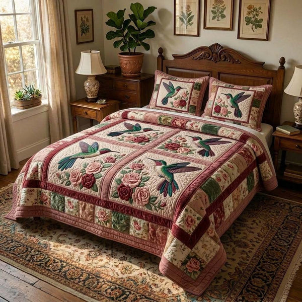 Rose Humming quilted 3-piece bedding set on a made bed with two matching pillow shams