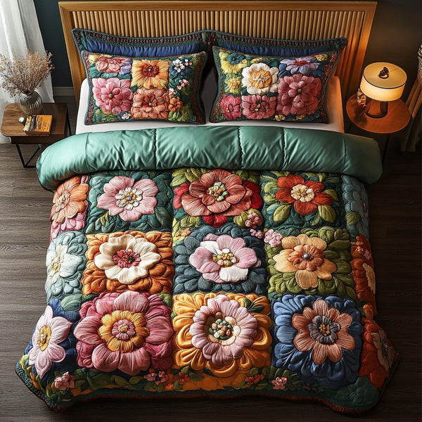Rosy Retreat quilted 3-piece bedding set on a made bed with two matching pillow shams