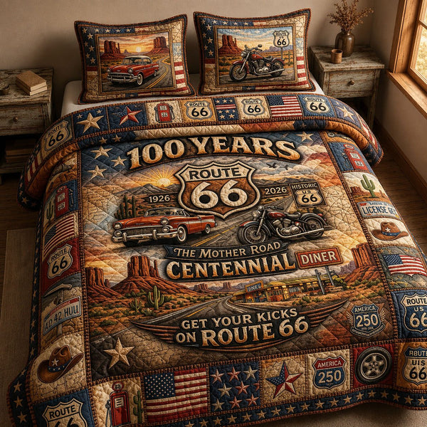 Route 66 Centennial 100 Years quilted 3-piece bedding set on a made bed with two matching pillow shams