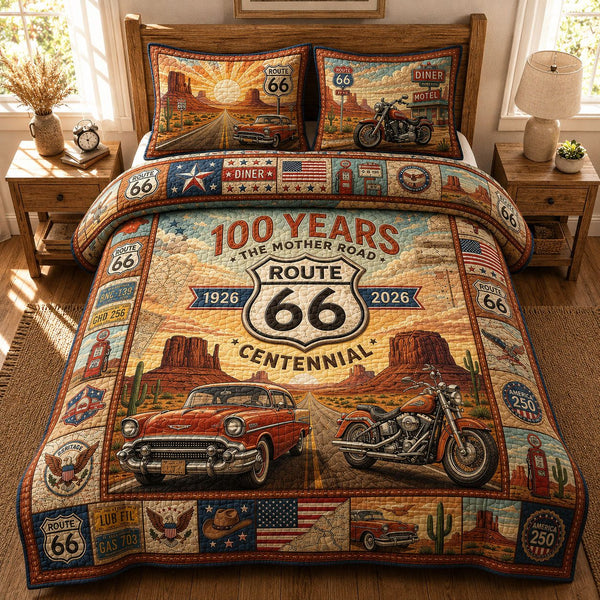 Route 66 Centennial 100 Years quilted 3-piece bedding set on a made bed with two matching pillow shams