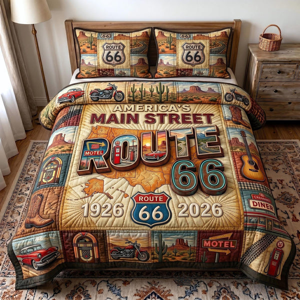 Route 66 Centennial quilted 3-piece bedding set on a made bed with two matching pillow shams