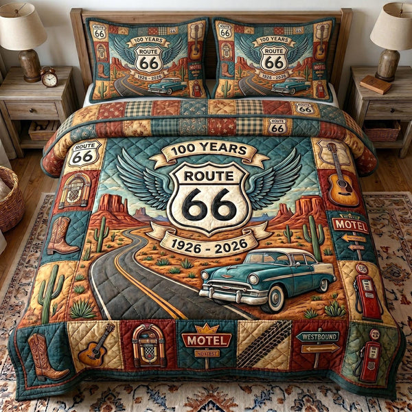 Route 66 Centennial quilted 3-piece bedding set on a made bed with two matching pillow shams