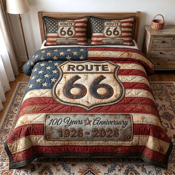 Route 66 Centennial quilted 3-piece bedding set on a made bed with two matching pillow shams