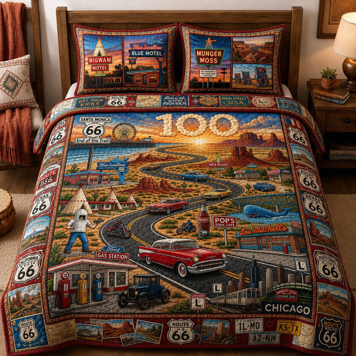 Route 66 Great Road Trip quilted 3-piece bedding set on a made bed with two matching pillow shams