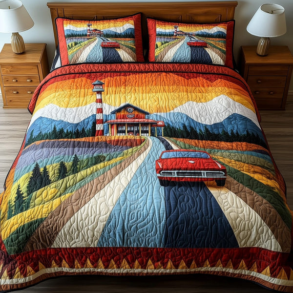 Route 66 quilted 3-piece bedding set on a made bed with two matching pillow shams