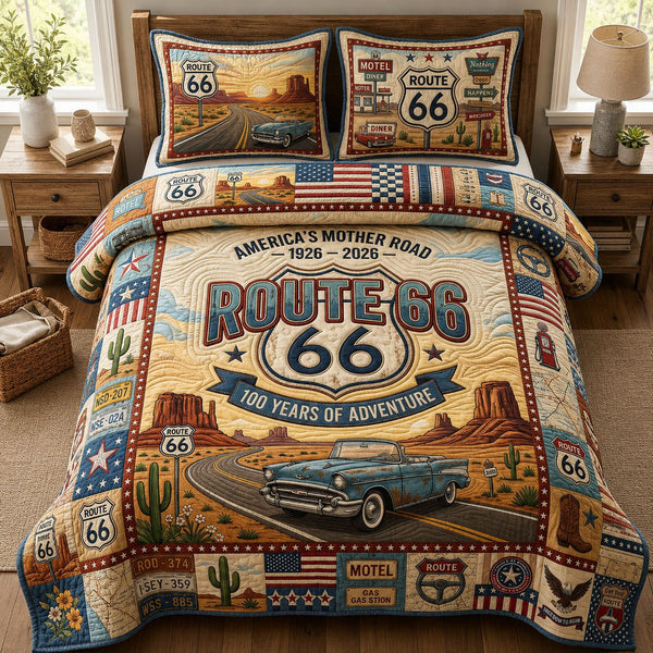 Route 66 Road Trip quilted 3-piece bedding set on a made bed with two matching pillow shams