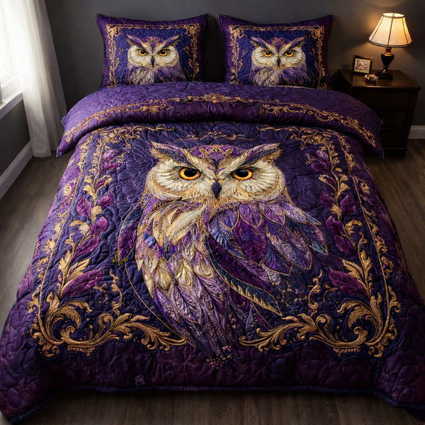 Royal Amethyst Owl quilted 3-piece bedding set on a made bed with two matching pillow shams