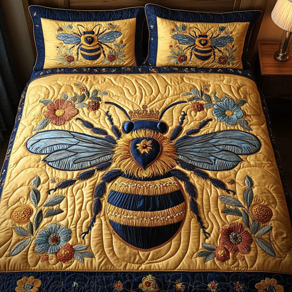 Royal Bee Majesty quilted 3-piece bedding set on a made bed with two matching pillow shams