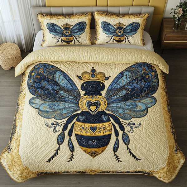 Royal Blue Bee quilted 3-piece bedding set on a made bed with two matching pillow shams