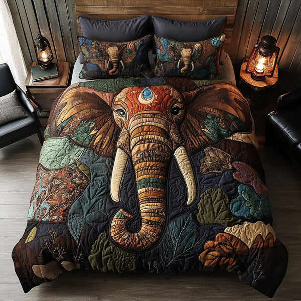 Royal Elephant quilted 3-piece bedding set on a made bed with two matching pillow shams