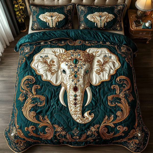 Royal Elephant quilted 3-piece bedding set on a made bed with two matching pillow shams