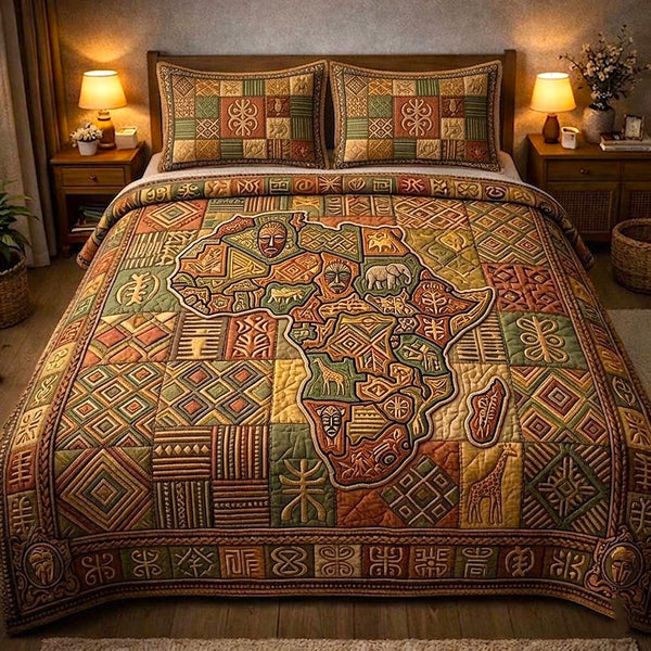 Royal Glow quilted 3-piece bedding set on a made bed with two matching pillow shams