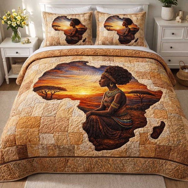 Royal Glow quilted 3-piece bedding set on a made bed with two matching pillow shams