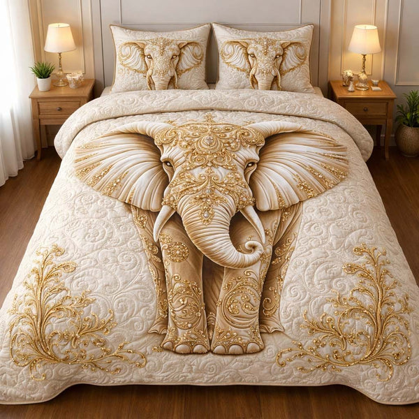 Royal Ivory Elephant quilted 3-piece bedding set on a made bed with two matching pillow shams