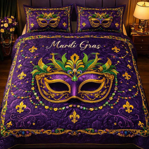 Royal Masquerade quilted 3-piece bedding set on a made bed with two matching pillow shams