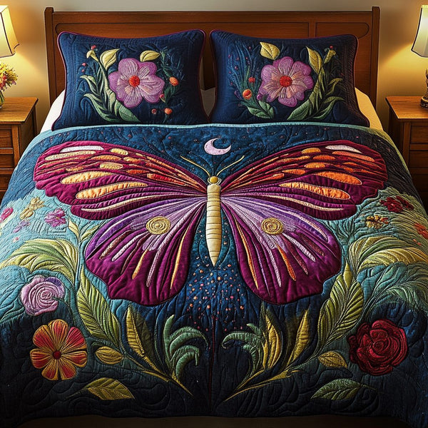 Royal Monarch quilted 3-piece bedding set on a made bed with two matching pillow shams