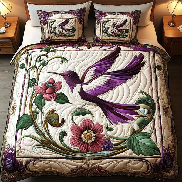 Royal Wings quilted 3-piece bedding set on a made bed with two matching pillow shams