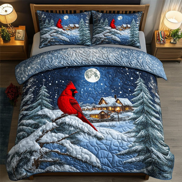 Ruby Wings quilted 3-piece bedding set on a made bed with two matching pillow shams