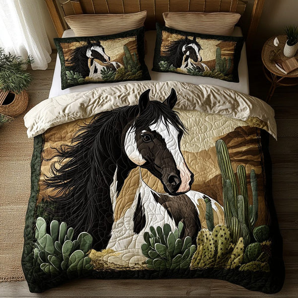 Run Wild quilted 3-piece bedding set on a made bed with two matching pillow shams