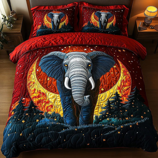 Sacred Elephant quilted 3-piece bedding set on a made bed in a softly lit bedroom
